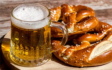 Oktoberfest Beer Mug and traditional German pretzels
